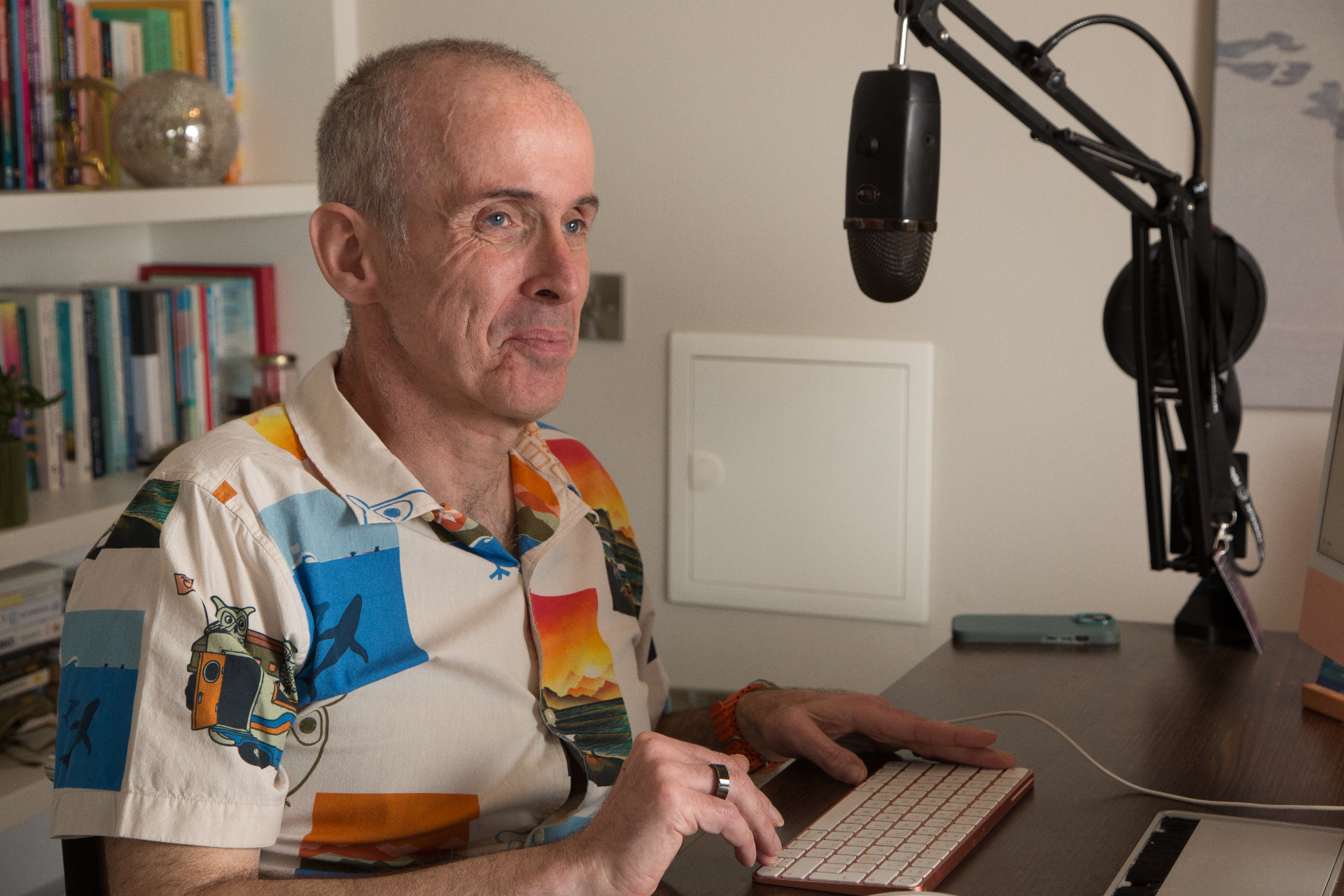 Gary Allen — Galway-based midlife and executive coach — at his recording desk.